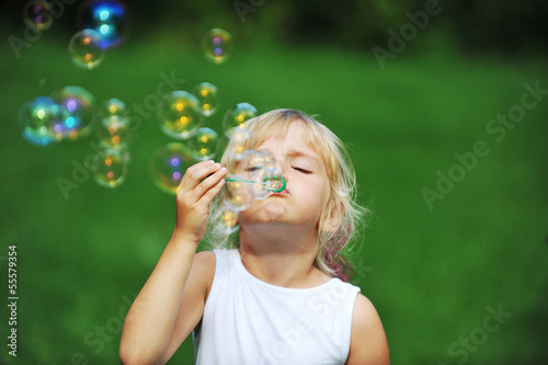 girl with bubble blower
