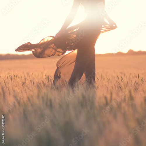 silhouette of woman body in the field