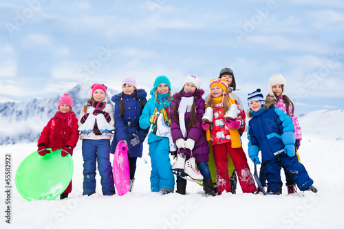 Kids together outside on cold winter day