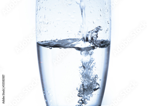 Splashing water into a glass