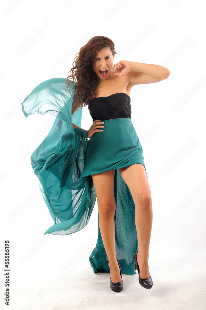 Naklejka premium Girl dancing with long green dress isolated white background