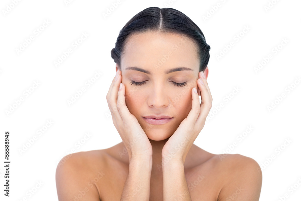 Young attractive model with hands on face Young attractive model with hands on face