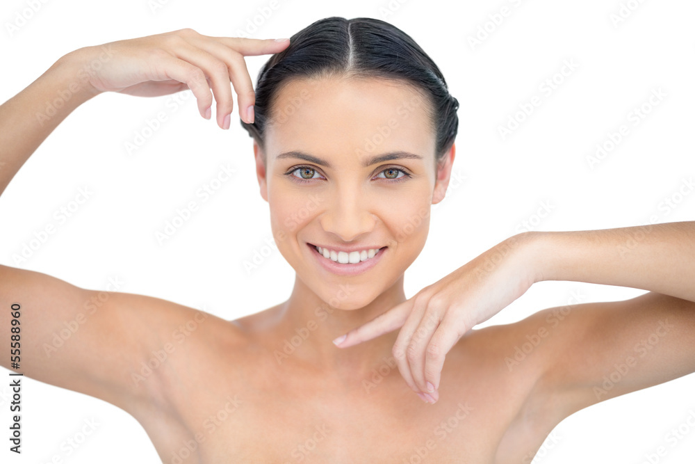 Smiling attractive topless model gesturing