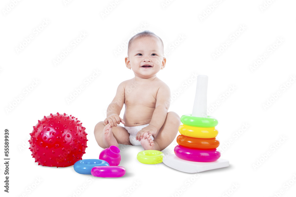 Baby sitting with toys - isolated Baby sitting with toys - isolated