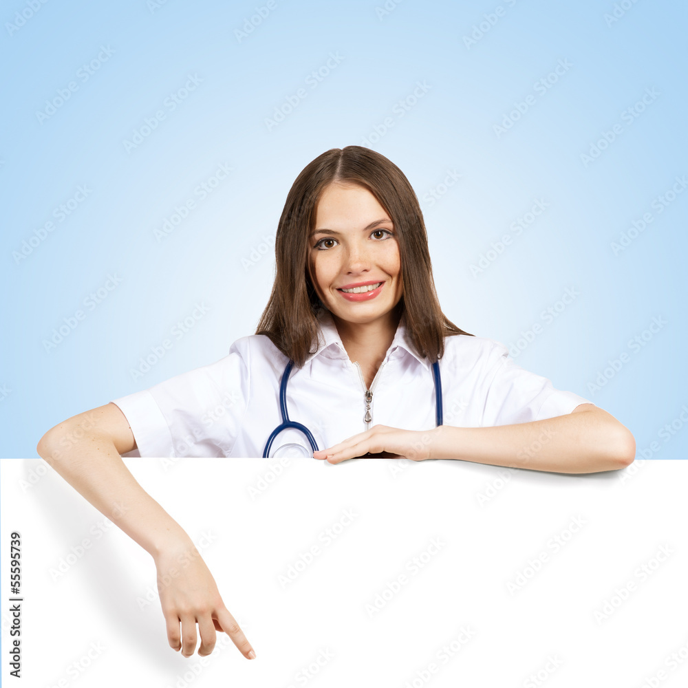 young woman doctor with a blank banner young woman doctor with a blank banner
