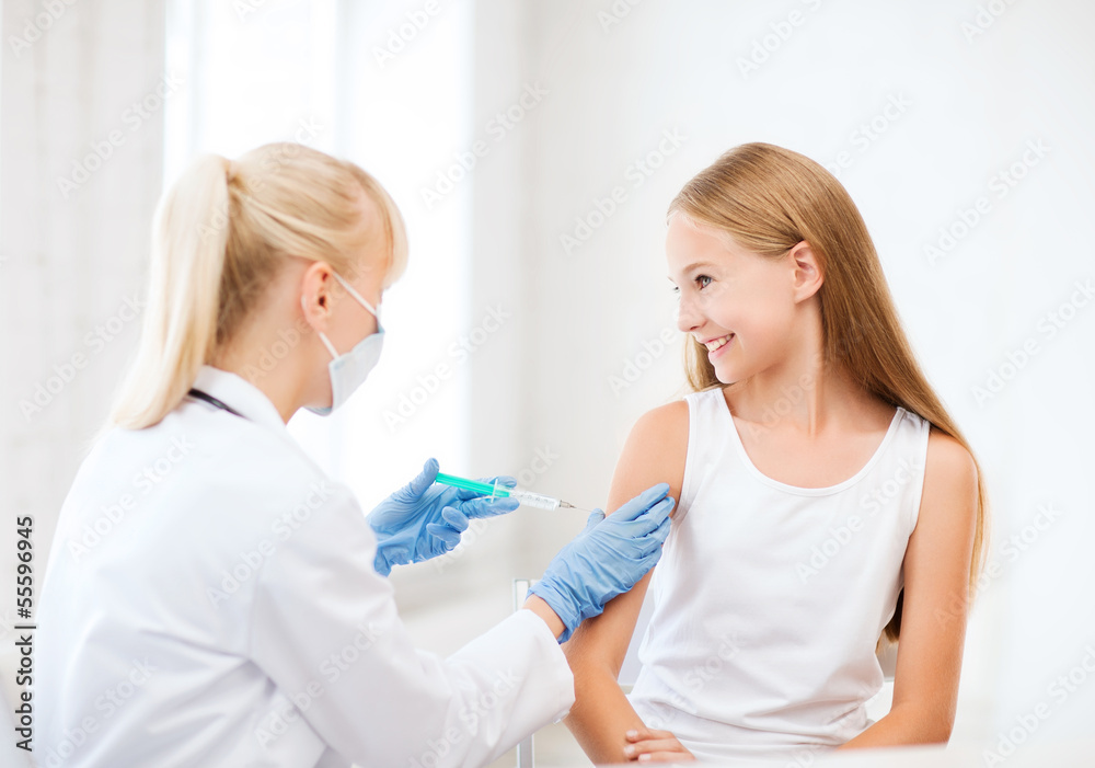 doctor doing vaccine to child in hospital doctor doing vaccine to child in hospital