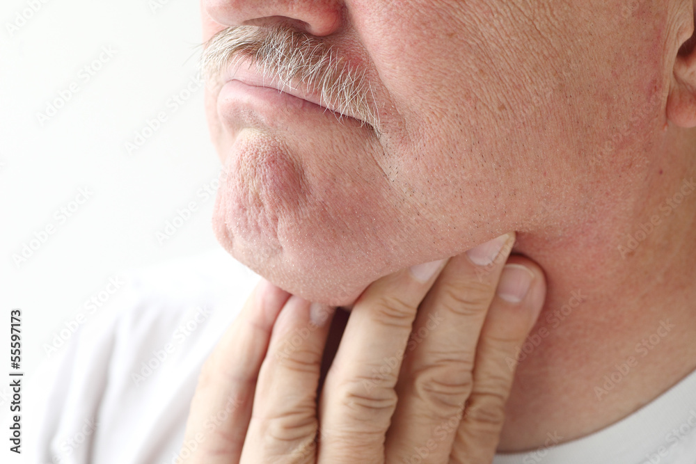 Fototapeta premium closeup of man with sore throat