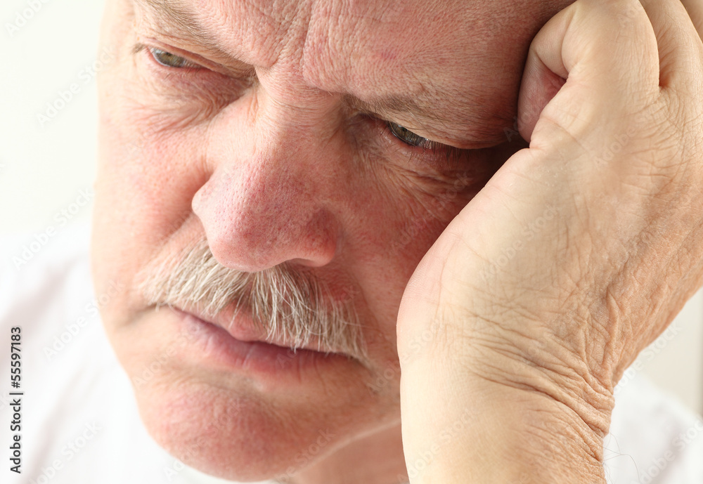 older man looking depressed older man looking depressed