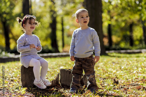 Kids at the autumn forest