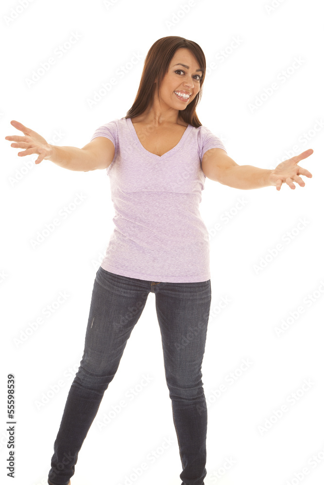 woman holding arms out in a purple shirt woman holding arms out in a purple shirt