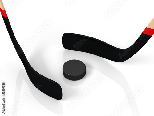 close up of an ice hockey stick and puck
