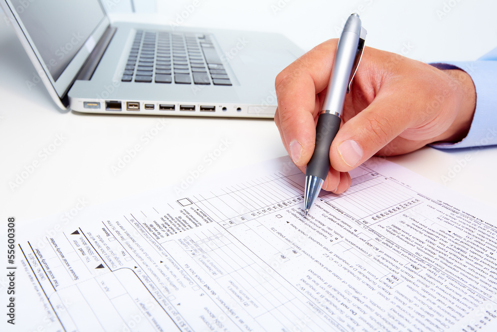 Businessman filling the form. Businessman filling the form.