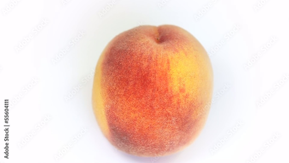 Ripe peach fruit rotating on white background Ripe peach fruit rotating on white background
