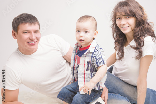 Happy three family members together photo