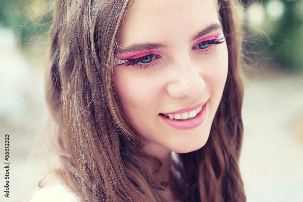 beautiful young girl with long hair and makeup for a walk beautiful young girl with long hair and makeup for a walk