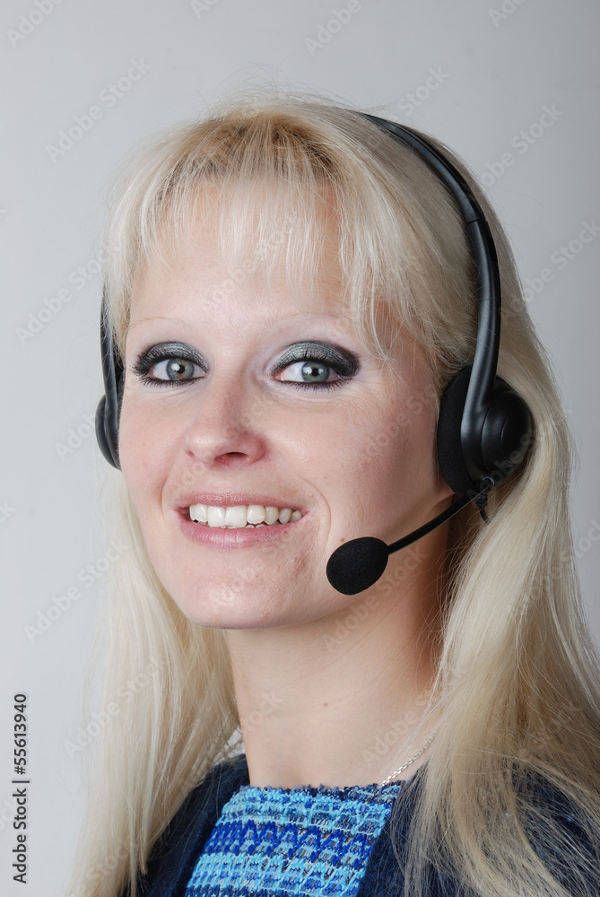 Portrait of young woman with headset Portrait of young woman with headset
