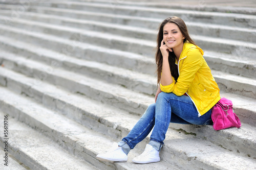 Fashionable girl in bright clothes outdoor portrait