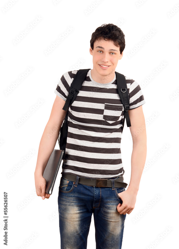 Happy student going to school smiling holding a notebook. Happy student going to school smiling holding a notebook.