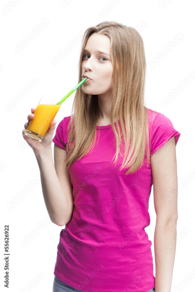 young beautiful blond woman drinking orange juice young beautiful blond woman drinking orange juice