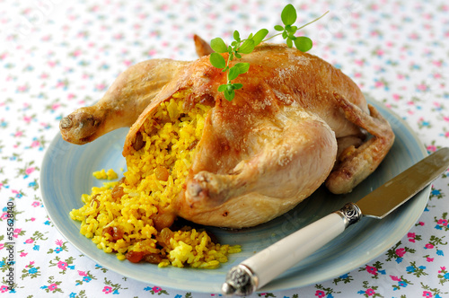 Whole Roast Chicken Stuffed with Curried Rice and Sultanas