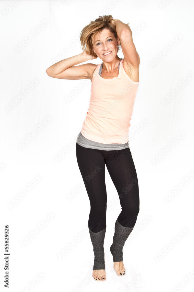 Cute woman standing and dancing on isolated white background Cute woman standing and dancing on isolated white background