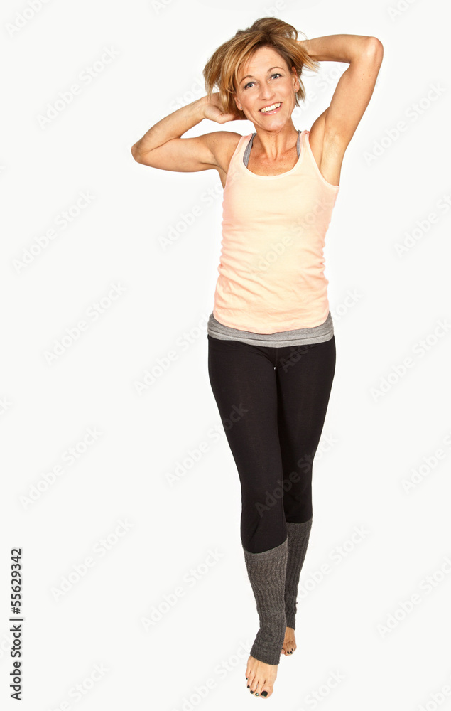 Cute woman standing and dancing on isolated white background Cute woman standing and dancing on isolated white background