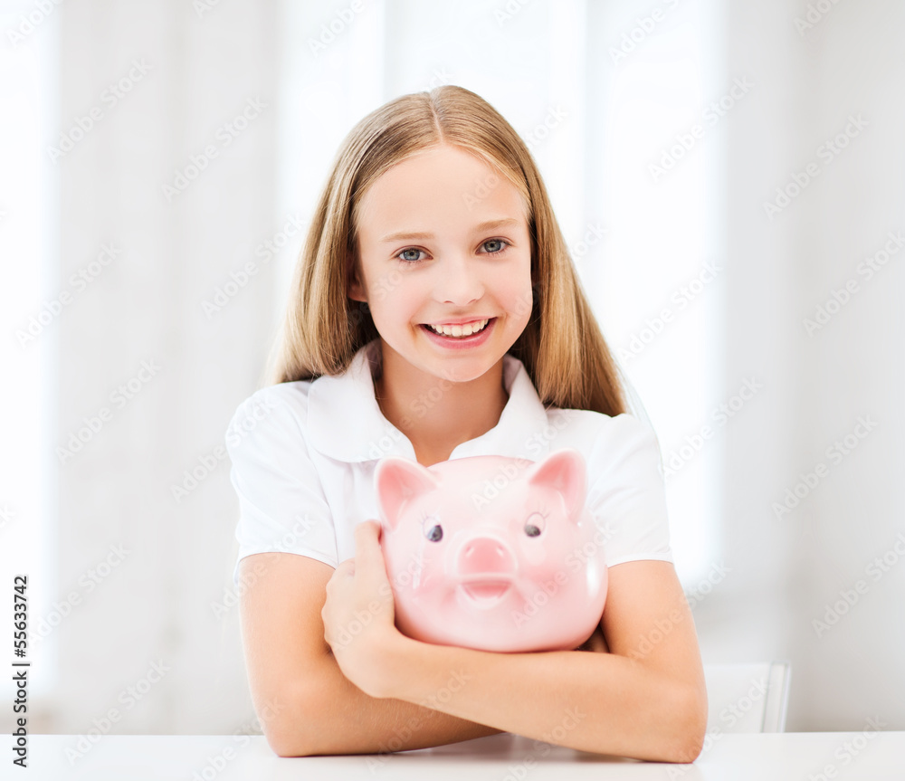 child with piggy bank child with piggy bank