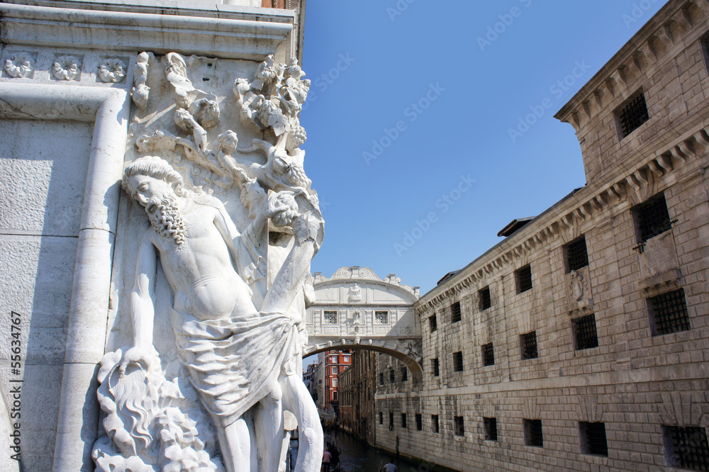 Bridge of Sighs and statue of Doges Palace, Venice, Italy