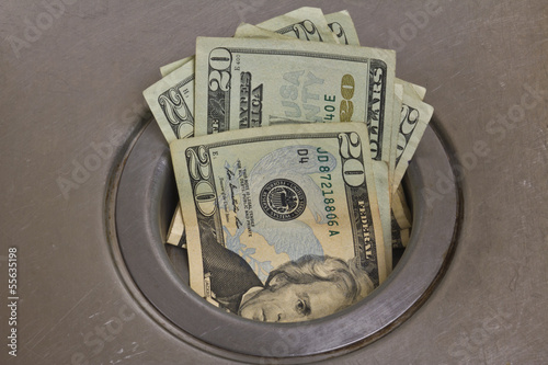 Foto Like Flushing Money Down The Drain