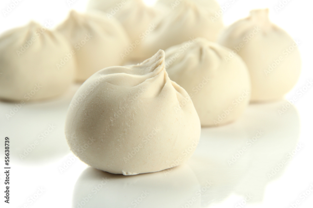 Raw khinkali, isolated on white Raw khinkali, isolated on white