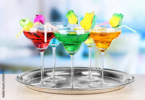 Different cocktails on bright background