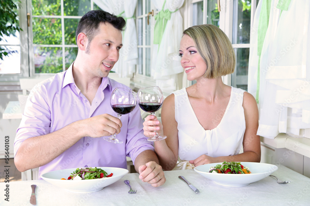 Beautiful couple having romantic dinner at restaurant Beautiful couple having romantic dinner at restaurant