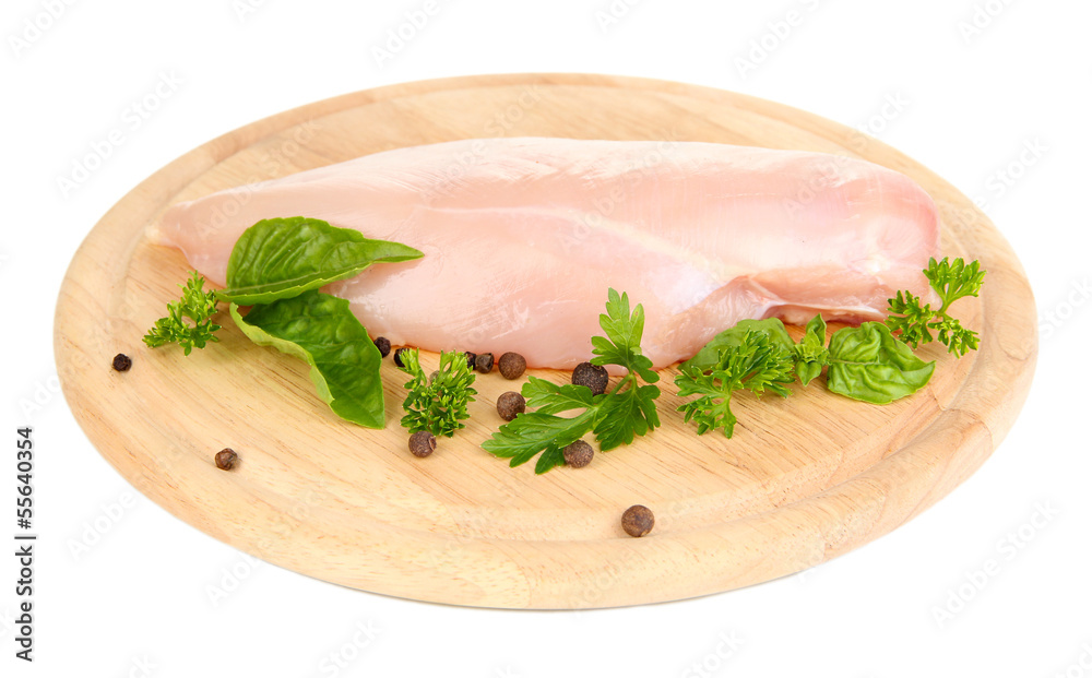 Raw chicken fillets on wooden board, isolated on white Raw chicken fillets on wooden board, isolated on white