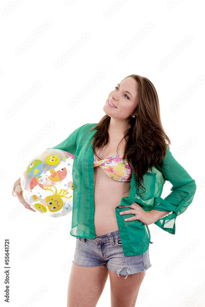Happy beautiful woman holding a beach ball, white background Happy beautiful woman holding a beach ball, white background