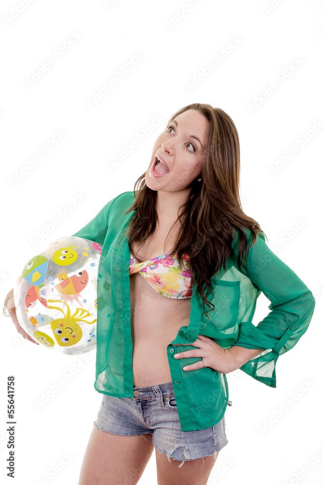 Happy beautiful woman holding a beach ball, white background Happy beautiful woman holding a beach ball, white background