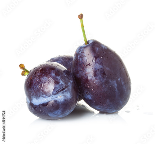 Group of plums isolated on a white background.