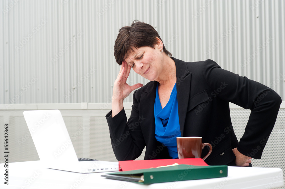 businesswoman under stress, fatigue, and headache businesswoman under stress, fatigue, and headache