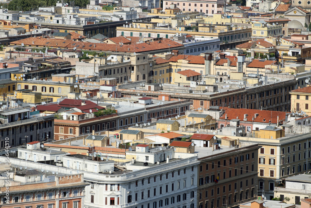 Aerial view of many houses close to each other with condominiums