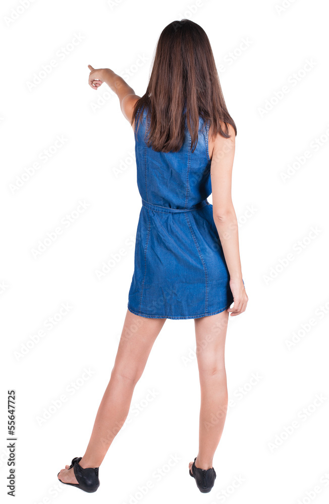 Back view of pointing woman. Back view of pointing woman.