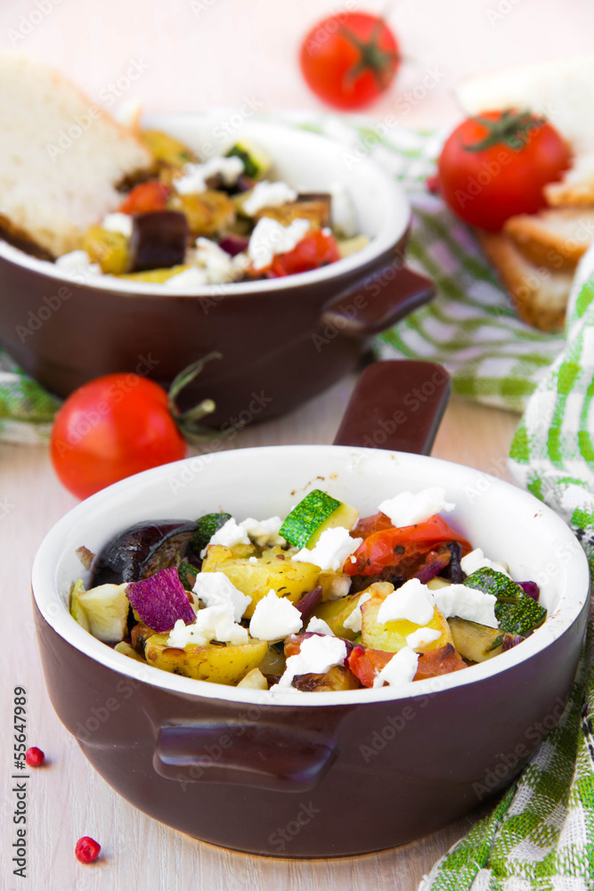 Baked vegetables with feta cheese in Greek style