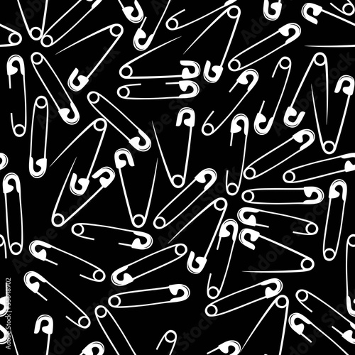 Pattern of safety pin isolated on background