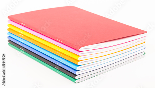 multicolored exercise books