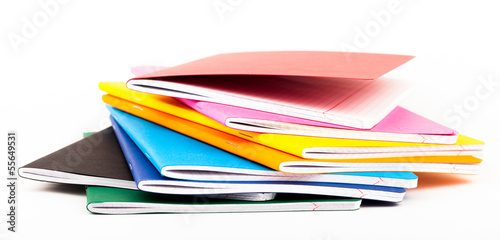 multicolored exercise books