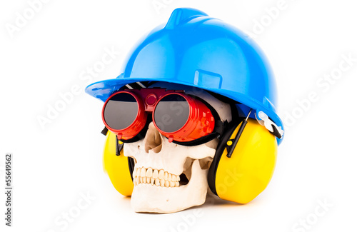 human skull with blue helmet and welder glasses
