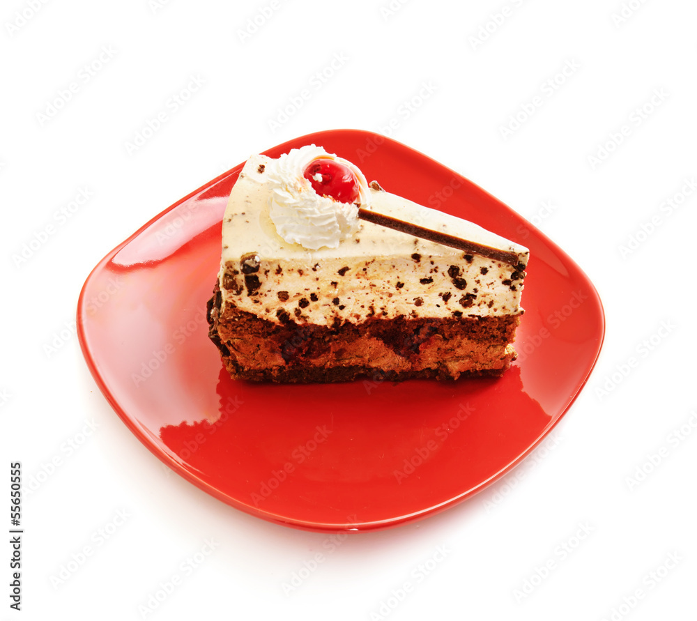 Chocolate cake on red dish Chocolate cake on red dish