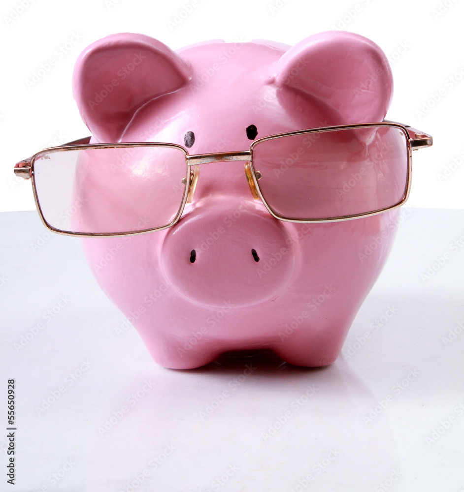 piggy bank with glasses in isolated white background piggy bank with glasses in isolated white background