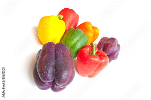 Bilde på lerret Purple, red, green and yellow bell peppers