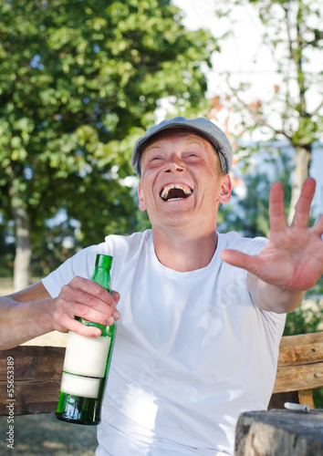 Laughing drunkard photo