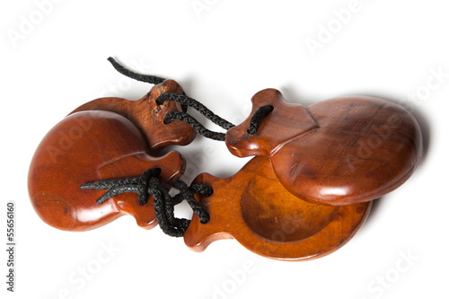 Castanets on white background photo