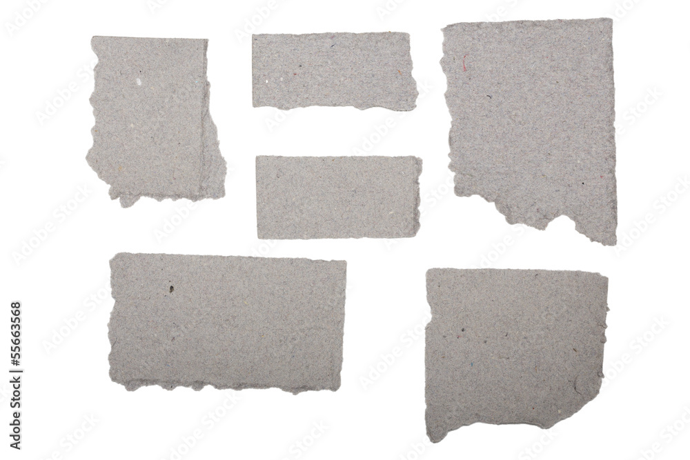 ripped  grey crumpled pieces of cardboard isolated on white